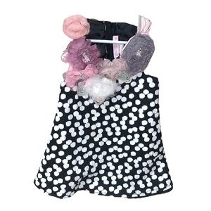 C’est Chouette black and white polka dot dress with floral embellishments